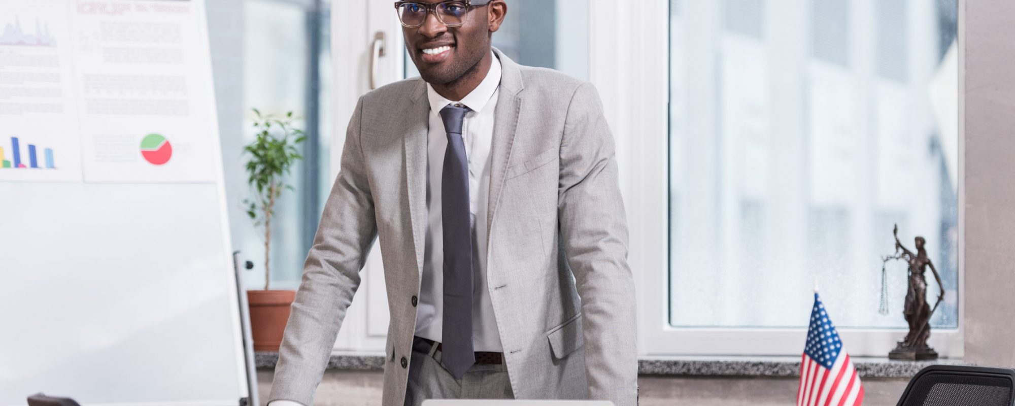 African american businessman smiling in modern office