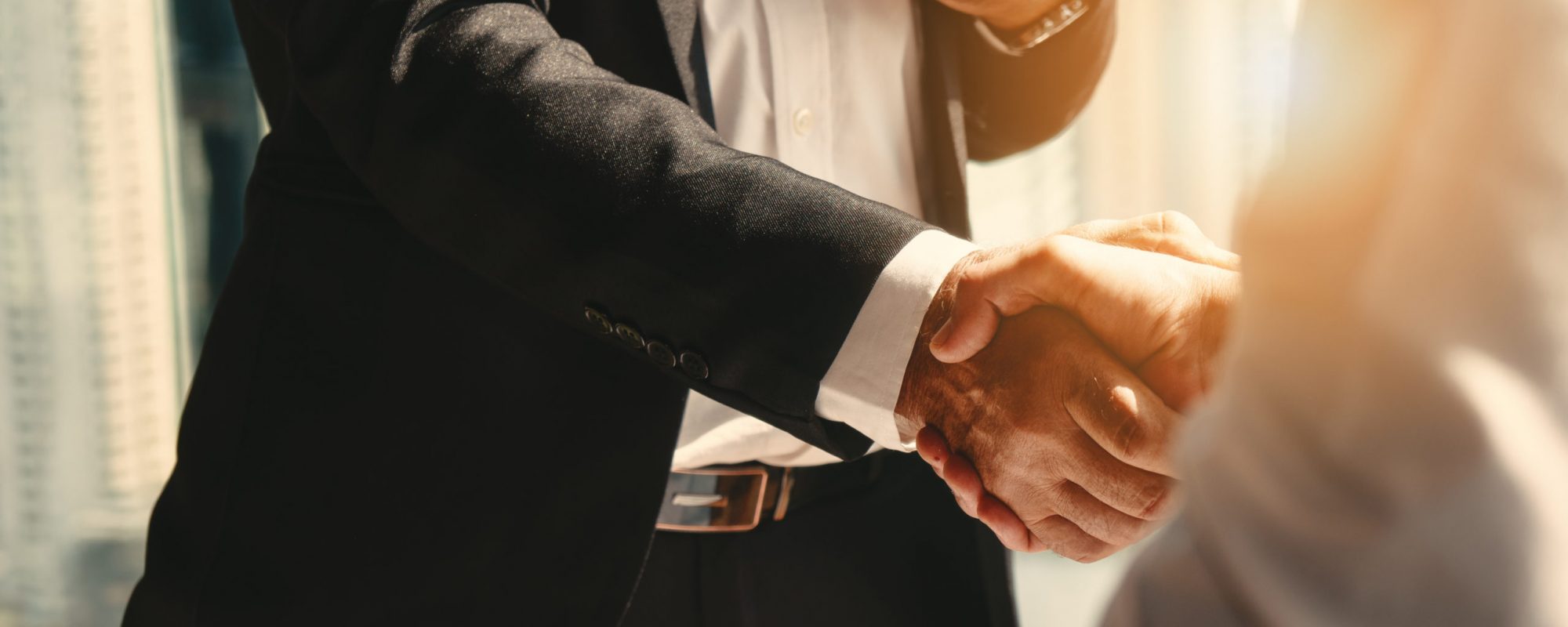 business background of businessman having handshake