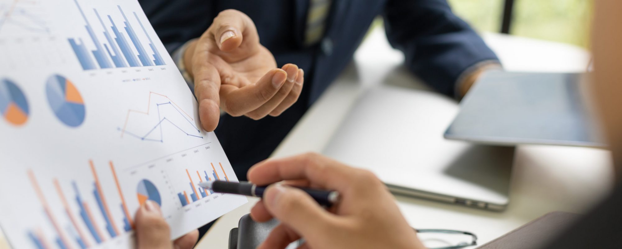 Business team collaboration to business profitability graph discussing performance analysis financial data and marketing report. Brainstorming meeting to strategy analysis and business planning.